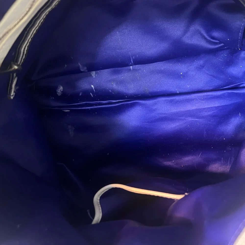 Henri Bendel Jetsetter convertible backpack with purple interior lining. - Picture 10 of 15